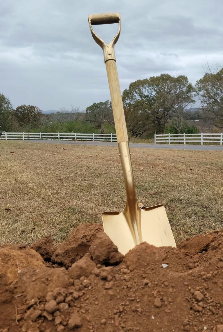 Groundbreaking shovel in the Dovetail Landing land
